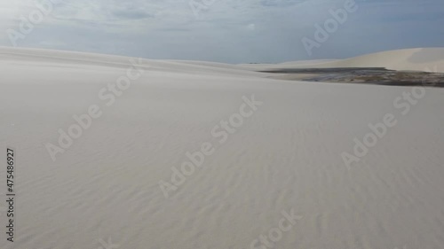 pan right on big white sand dunes of Lencois Maranhenses, northeast Brazil photo