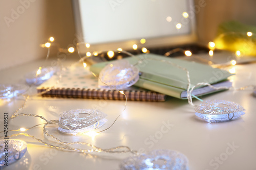 Christmas lights and notebo...