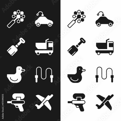 Set Toy truck, Shovel toy, Rattle baby, Radio controlled car, Rubber duck, Jump rope, plane and Water gun icon. Vector
