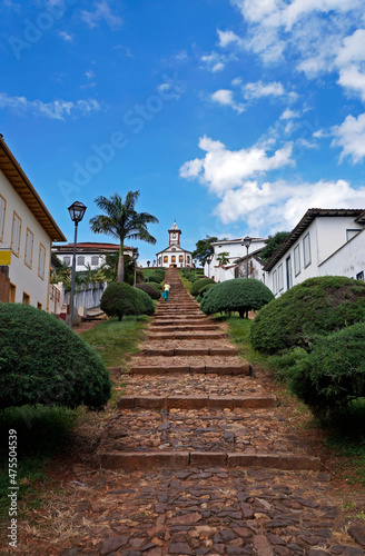 Stone staircase and baroque church at historical center of Serro, Minas Gerais, Brazil photo