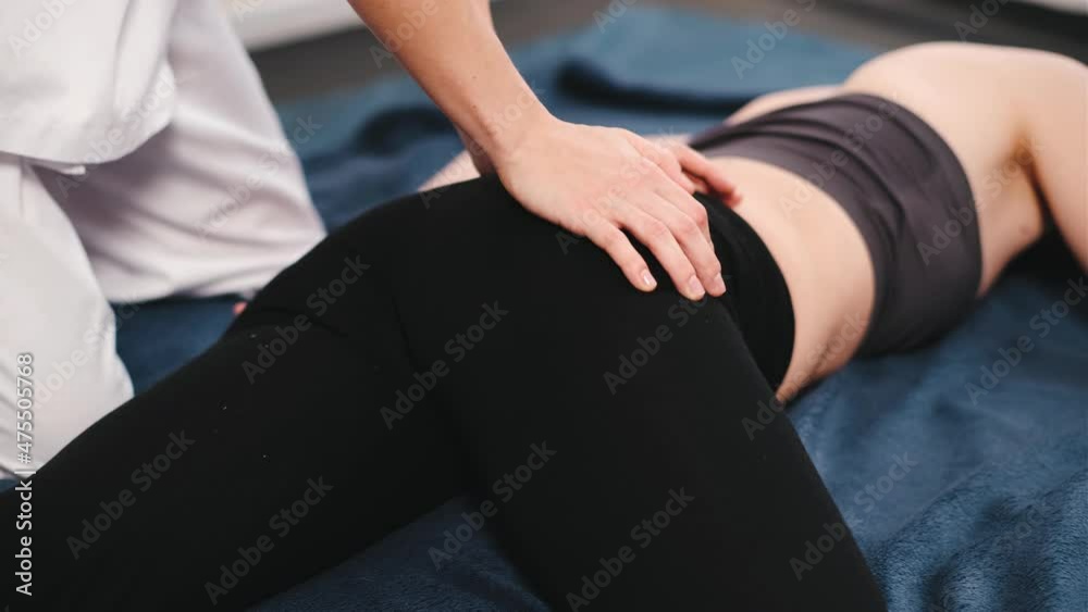 Traditional chinese acupressure massage of female legs, feet Traditional chinese acupressure massage of female legs, feet