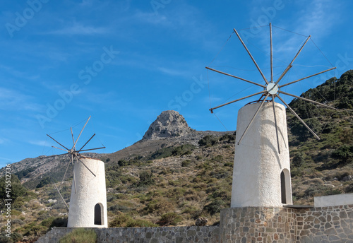 Traditional white-sailed windmills (wind-pumps) in use since the 1920s to irrigate the land in the Lasithi (Lassithi) Plateau, Eastern Crete, Greece.