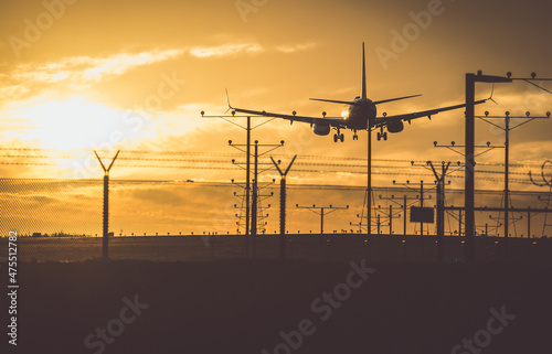 Airplane landing on the track © oneinchpunch