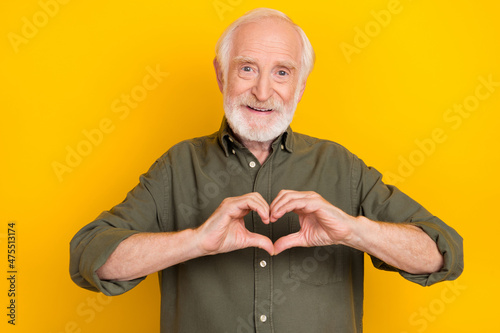 Obraz na płótnie Photo of cheerful candid aged person hands fingers make heart symbol isolated on