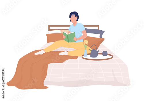 Person reading on bed semi flat color vector character. Posing figure. Full body person on white. Hygge lifestyle isolated modern cartoon style illustration for graphic design and animation