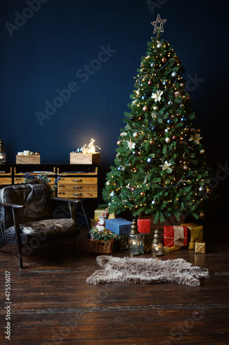 New Year's interior, holiday, Christmas, cozy and warm. Christmas tree and fireplace 