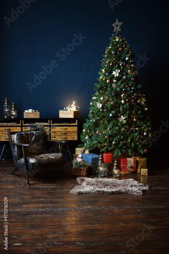 New Year's interior, holiday, Christmas, cozy and warm. Christmas tree and fireplace 