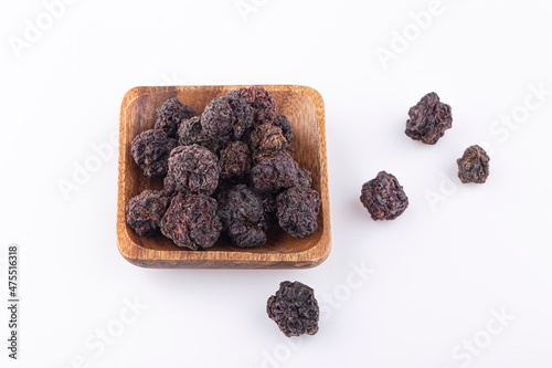 Dried cudrania tricuspidata fruit on a white background. photo