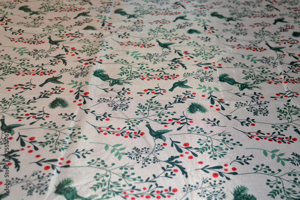 Fototapeta premium christmas table tablecloth white background green red