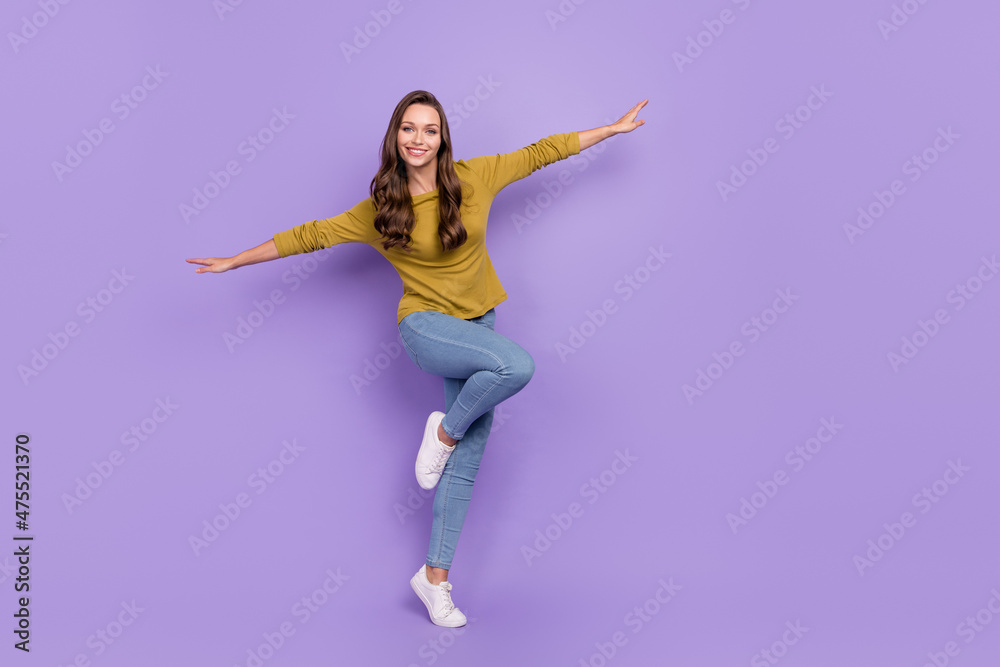 Full size portrait of satisfied glad person arms flying toothy smile isolated on violet color background