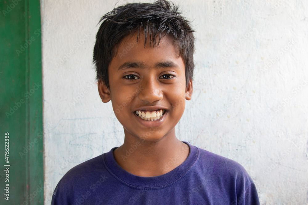 Portrait of a young rural boy smiling 