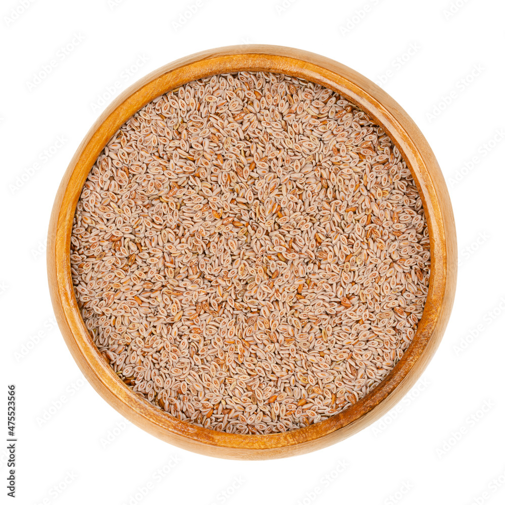 Foto de Whole psyllium seeds, in a wooden bowl. Plantago ovata, known
