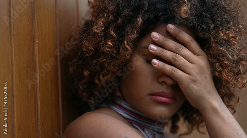 Worried black African woman suffering from emotional problems