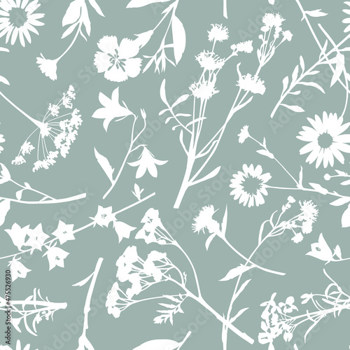 Seamless vector pattern with wildflower silhouettes. Perfect for textile, wallpaper or print design. 