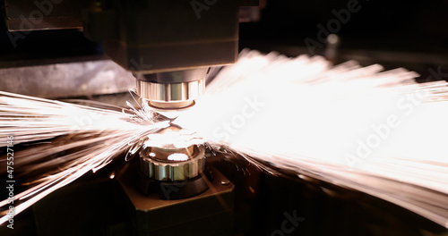 Neon sparks fly of machine head for metal processing laser metal photo
