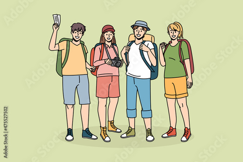 Hiking backpacking and tourism concept. Group of young smiling travelers backpackers standing with camera feeling excited with trip vector illustration 