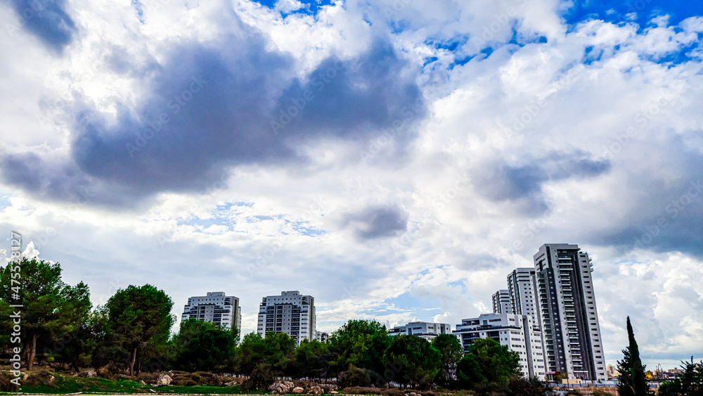 city skyline with clouds and buildings city skyline with clouds and buildings