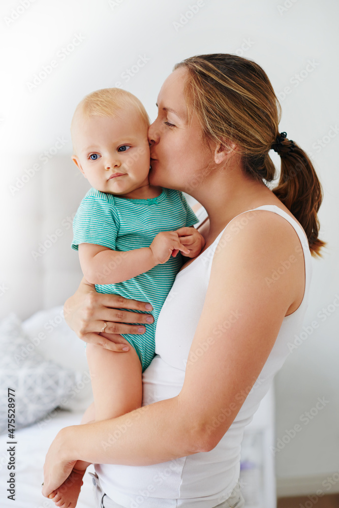Mom just keeps those kisses coming Mom just keeps those kisses coming