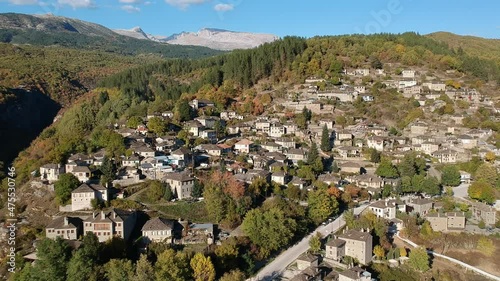Aerial panoramic view of the picturesque village Kipi Located near Dilofo village in Epirus, Greece. Scenic aerial view of traditional Greek villages in Autumn. Epirus, Greece, Europe. photo