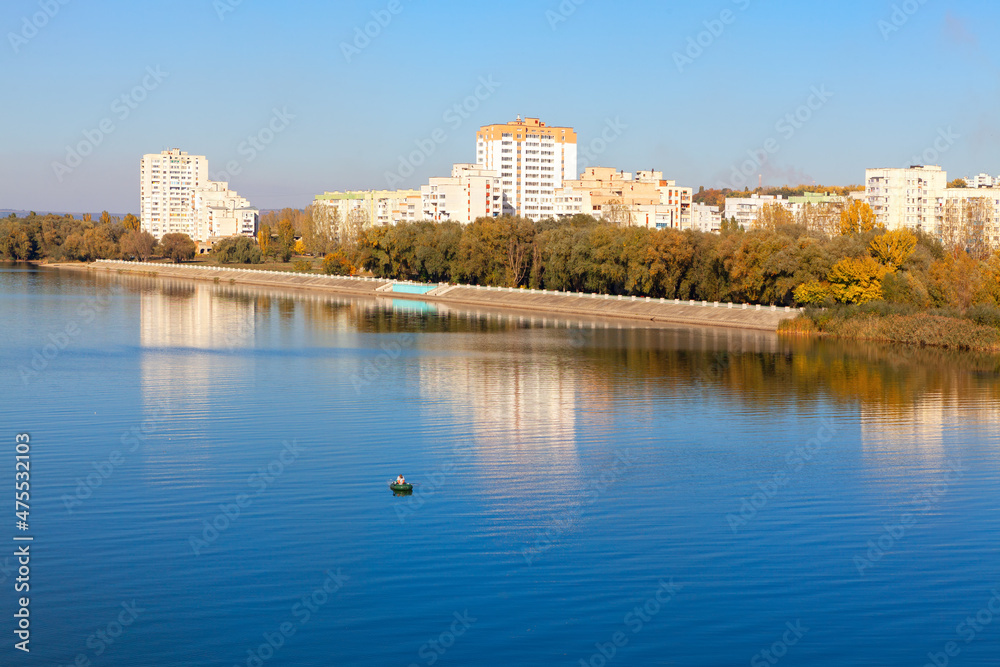 Coastal city scenery . Residential district situated at the river bank 