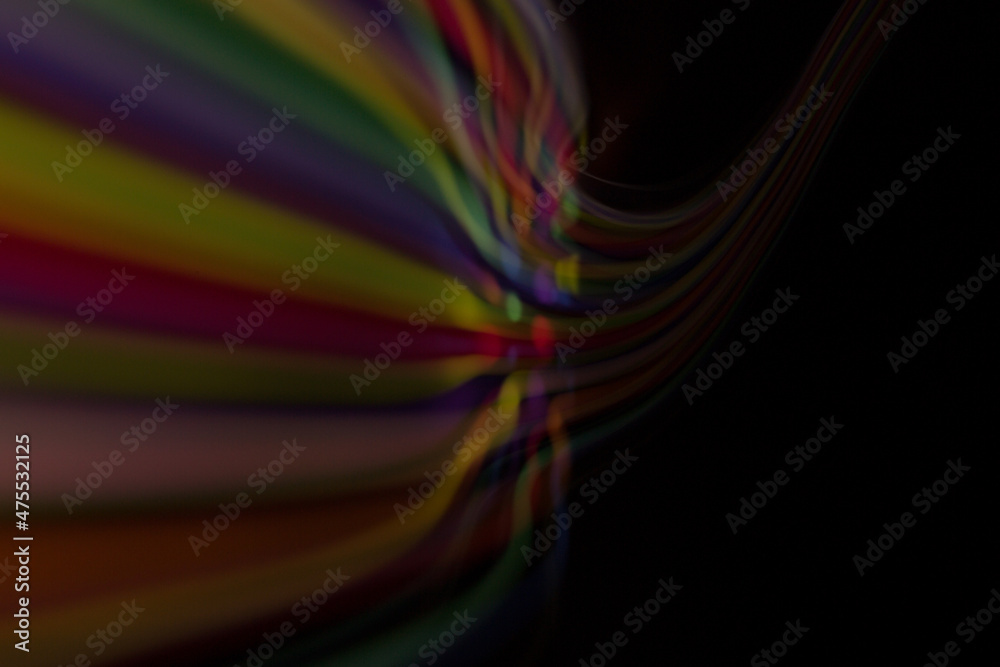 Colored lines of light on a black background. Colored lines of light on a black background.