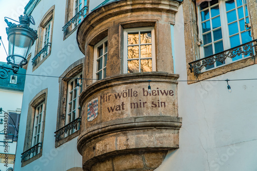 Translation - we want to remain what we are - Luxembourg national motto on medieval houses in Luxembourg City