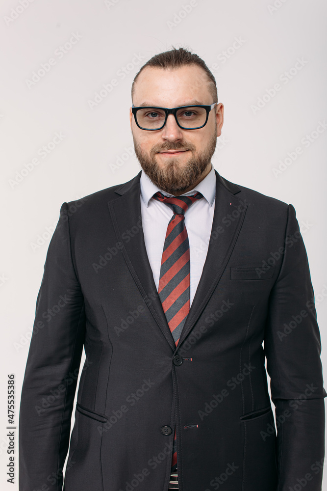 young man, business, sociable speaker, businessman, in a suit, in the studio on a white background. young man, business, sociable speaker, businessman, in a suit, in the studio on a white background.