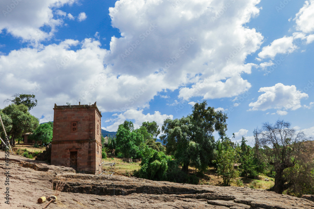 Naklejka premium Lalibela, Ethiopia - August 20, 2020: Outside view to the Ancient African Churches 