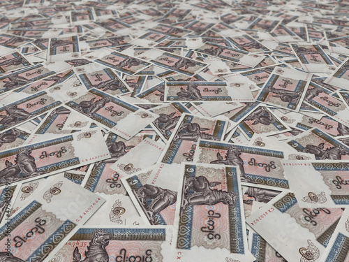 Closeup shot of piled Myanmar pyas banknotes photo