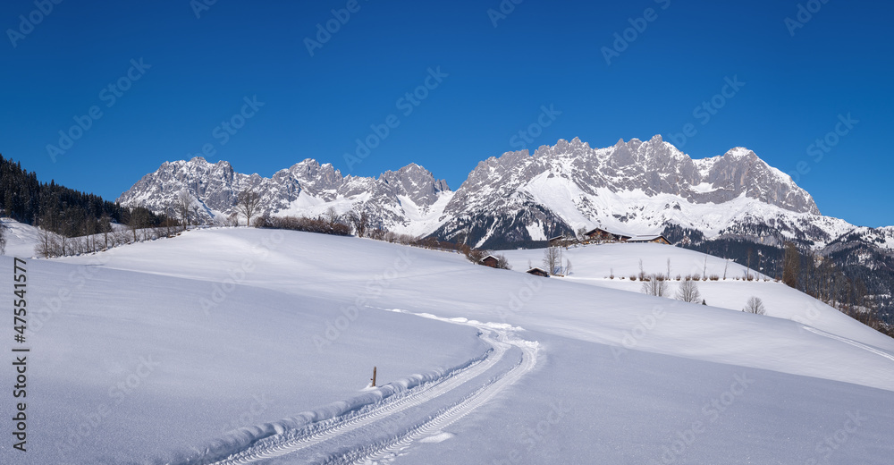 Panoramic view of the Wilder Kaiser mountain range in Winter, Tyrol, Austria Panoramic view of the Wilder Kaiser mountain range in Winter, Tyrol, Austria