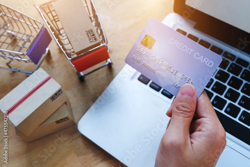 Customer Paying by credit card,Shopping online e-comerce concept