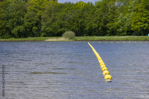 Landscape view of yellow buoys in a lake. Bussloo, Netherlands photo