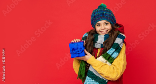 seasonal christmas sales. cheerful teen girl in with box. boxing day. present and gifts buy.