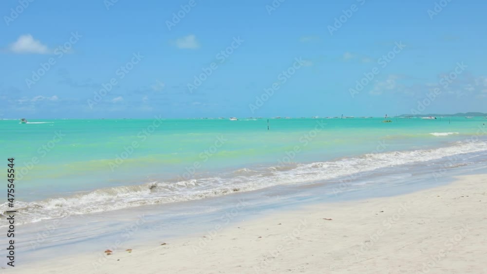 Walking at a Maragogi beach, known as the Brazilian caribbean. Barra Grande beach, tourist destination of the brazilian northeast. Walking at a Maragogi beach, known as the Brazilian caribbean. Barra Grande beach, tourist destination of the brazilian northeast.