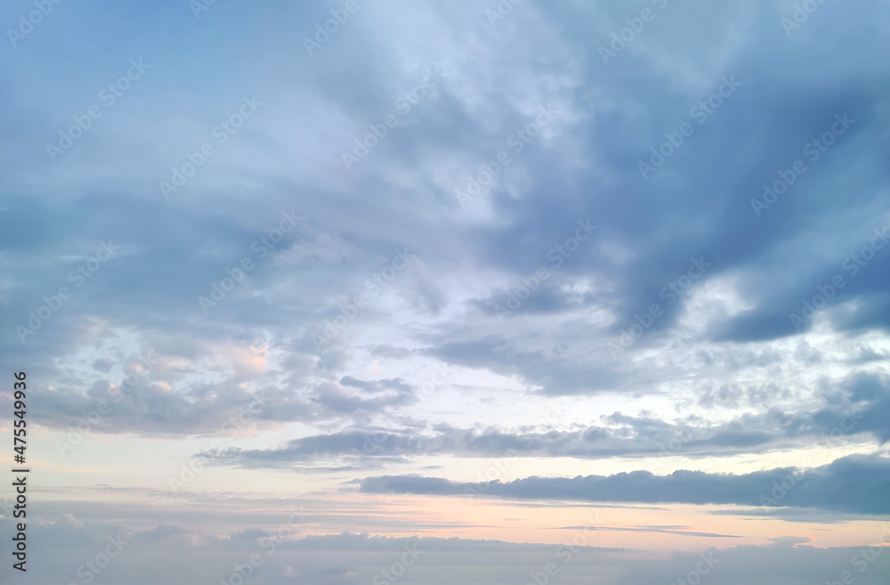 Beautiful blue and orange cloudy sky at sunset Beautiful blue and orange cloudy sky at sunset