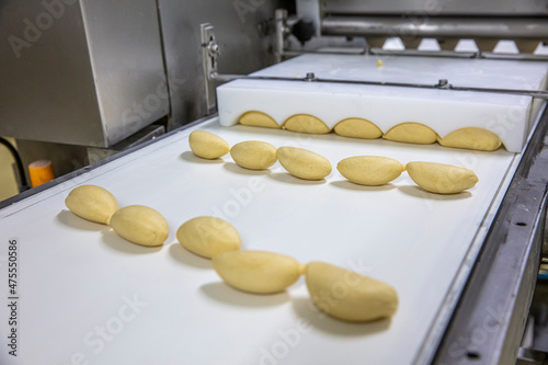 Production of sekerpare dessert in the dessert production factory. Delicious turkish sweet sekerpare on the tray. Turkish Ramadan sweet Sekerpare. photo