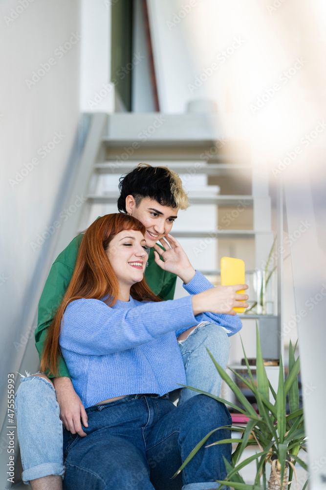 Lesbians taking selfie on smartphone Lesbians taking selfie on smartphone