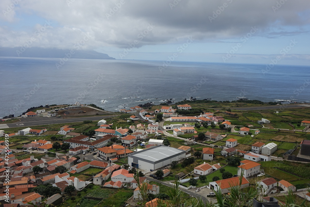 Scenic view on Vila do Corvo with the runway and Flores in the background, Corvo, Azores, Portugal