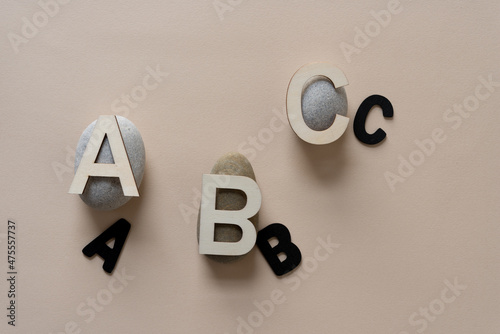 Photography letters and stones on paper