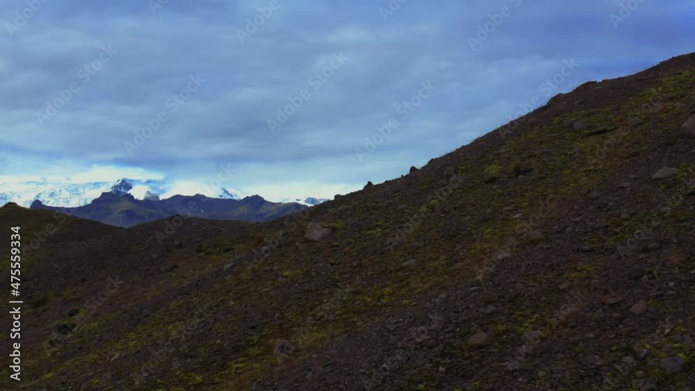 Aerial flight over the stone hill with a great view of Iceland's nature Aerial flight over the stone hill with a great view of Iceland's nature