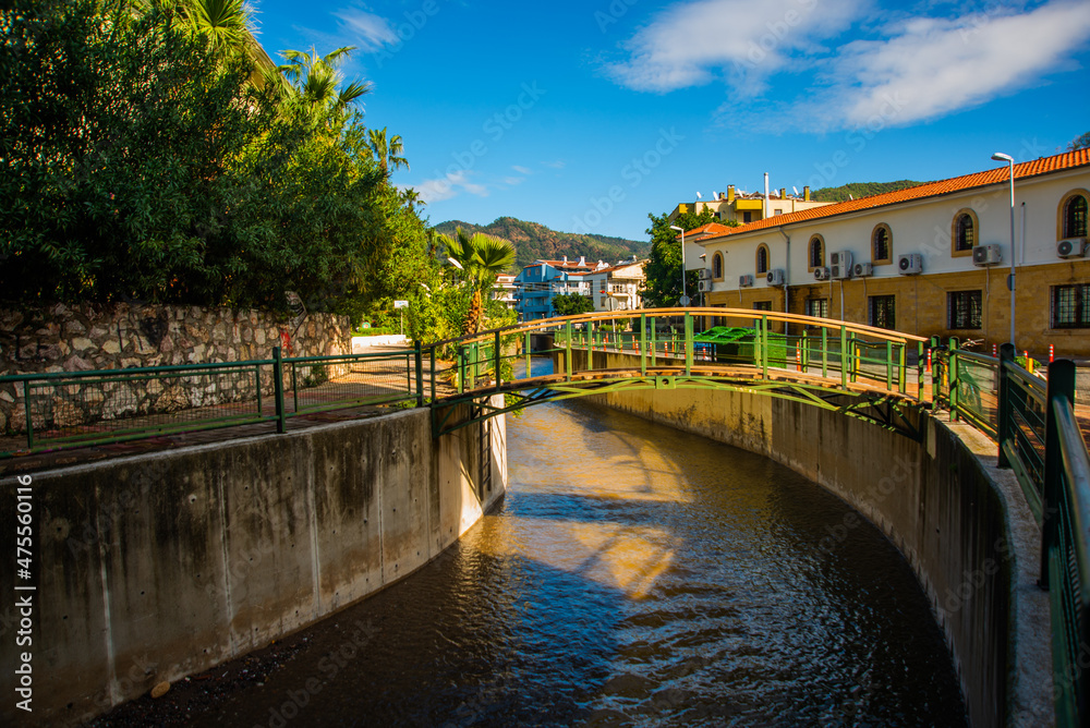 MARMARIS, TURKEY: Canal with water on the street of the city of Marmaris on a sunny day.
