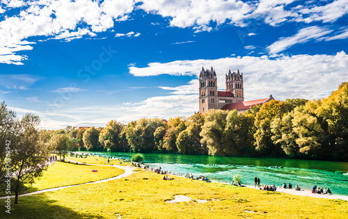 View on summer landscape by St. Maximilian church and Isar in Munich