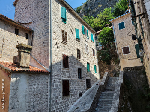 Fototapeta Naklejka Na Ścianę i Meble -  Ancient street, historical building in the old town of Kotor, Montenegro, Europe, Adriatic sea and mountains