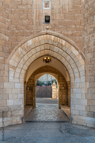 Arched entrance to the courtyard of Saint George s Cathedral in Jerusalem Israel 