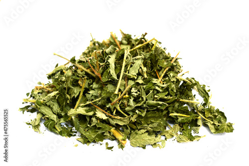 Agrimonia eupatoria, agrimony herb, dried plant pile at white background