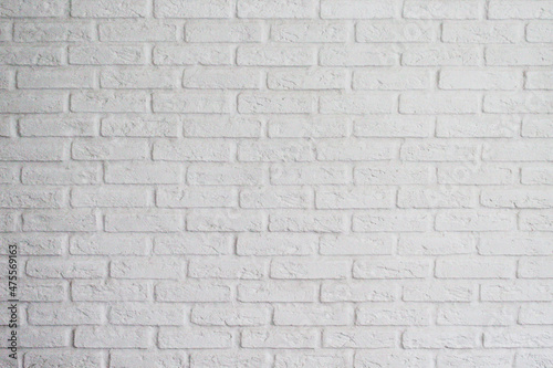 Abstract geometric background. Cement wall. White bricks.