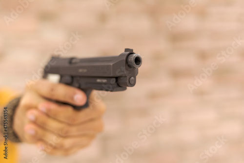 Man handling firearm 