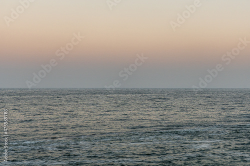 Sunset over the Black sea in Ukraine abstract seascape water surface beautiful cloudscape © olegmayorov