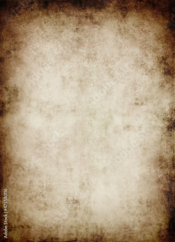 Grunge background made of old brown paper with a vignette