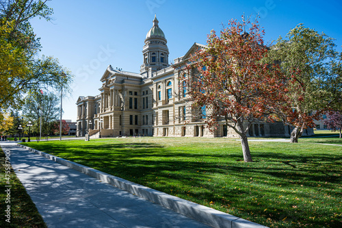 External view of the State Capitol against a clear blue sky on a sunny day in Wyoming, USA photo